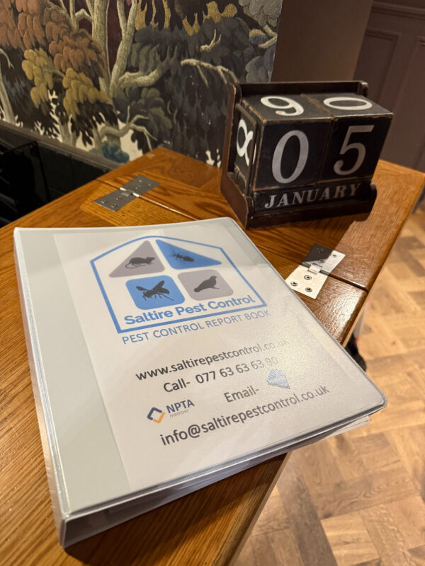 Onsite pest control folder with inspection reports and health and safety data sheets